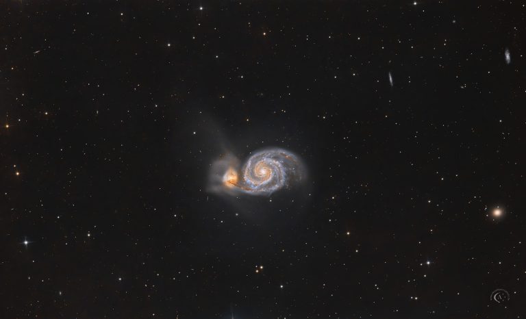 Ausschnitt der Whirlpool-Galaxie M51 mit ausgeprägten Spiralarmen und der wechselwirkenden Begleitgalaxie NGC 5195.